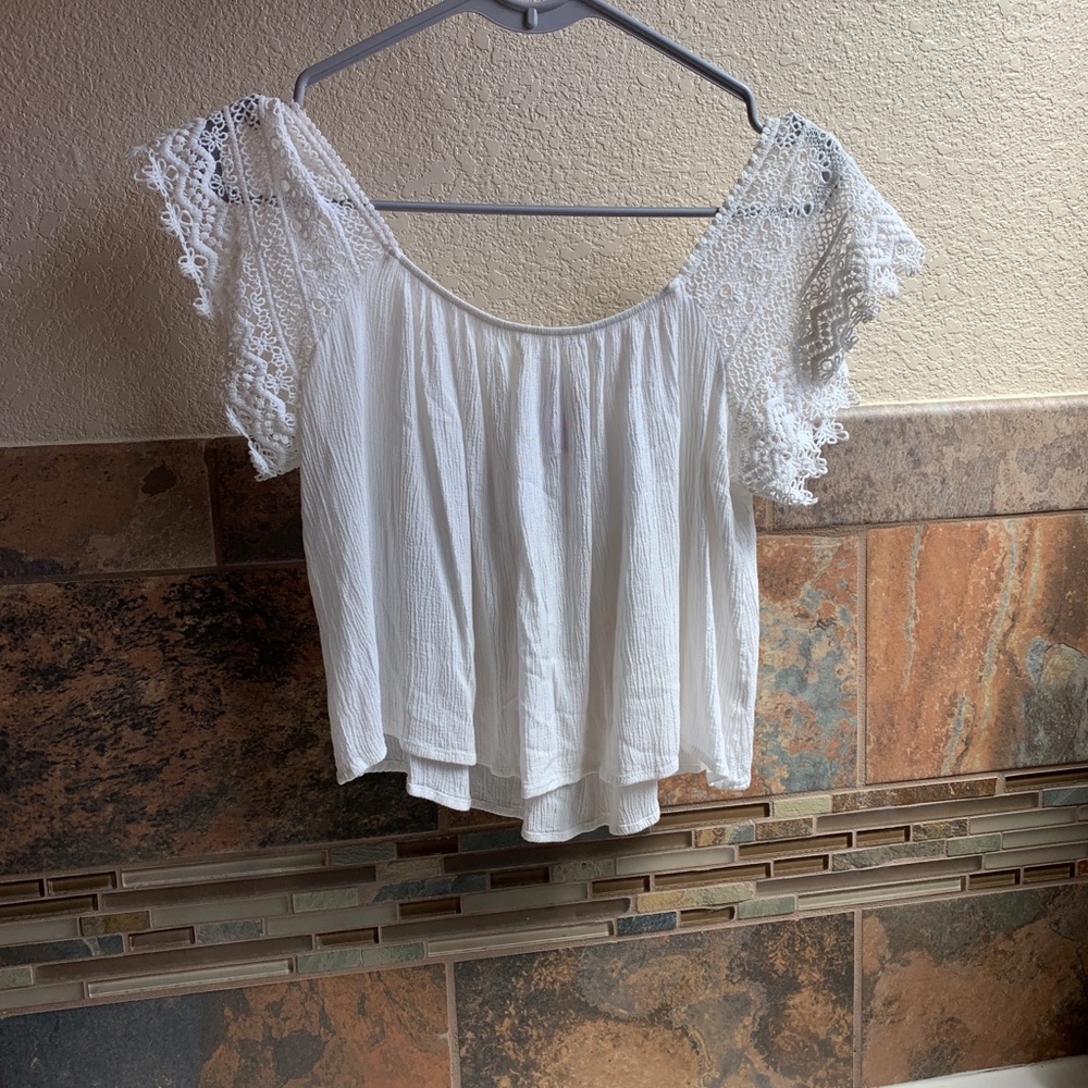 Francesca’s white off the shoulder top
